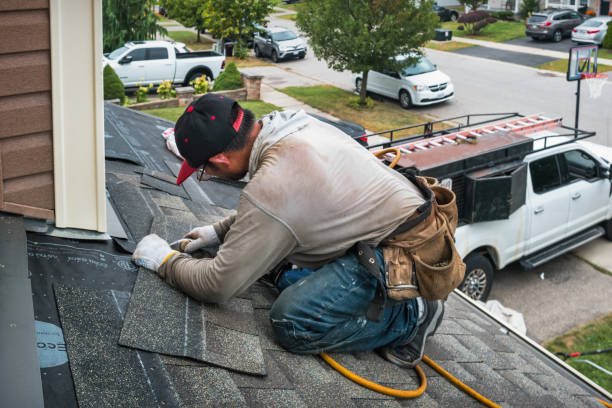 Professional Emergency Roof Repair technician working in Ridge, NY
